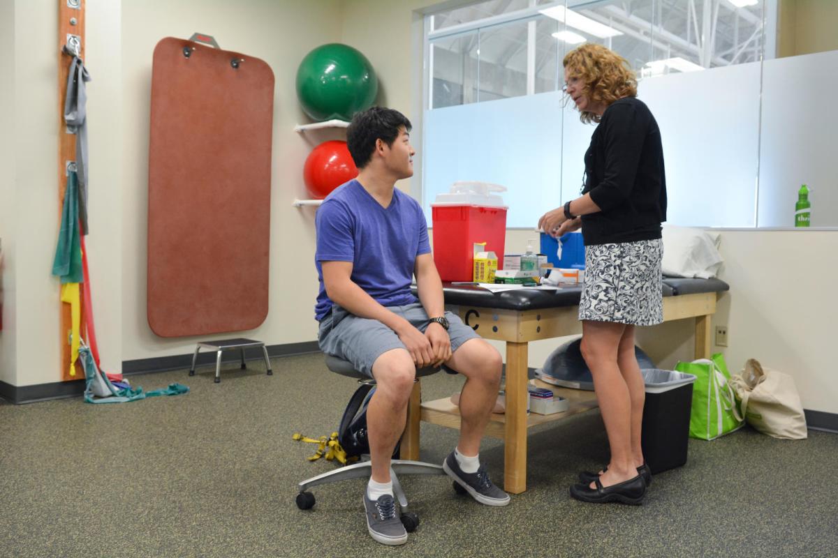 Student receives flu shot at CU Boulder Rec Center