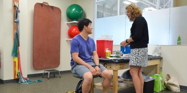 Student receives flu shot at CU Boulder Rec Center