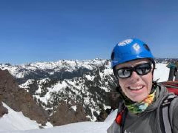 Image of Emily Walbridge on a mountain top